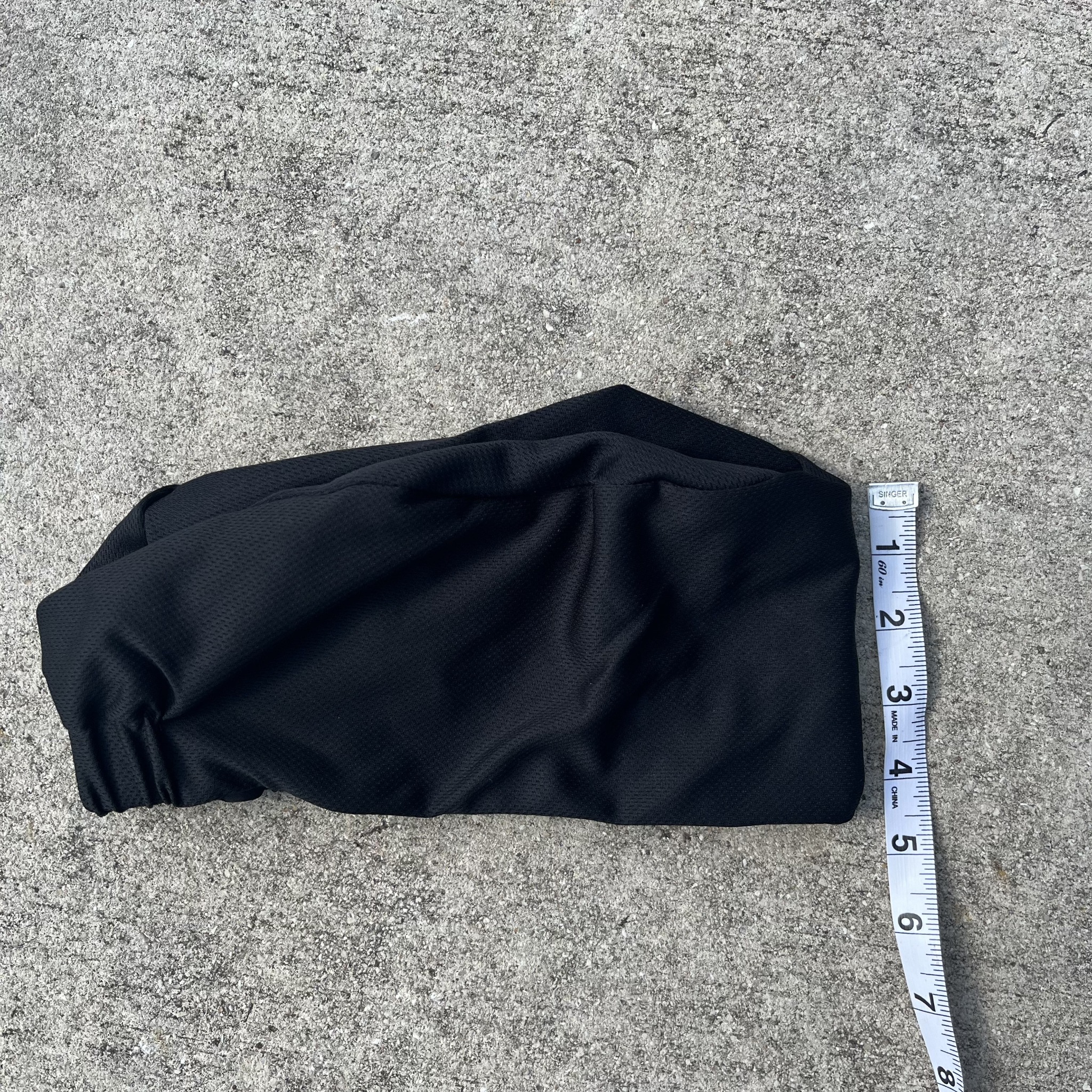 Shallow cap profile measured beside a tape
